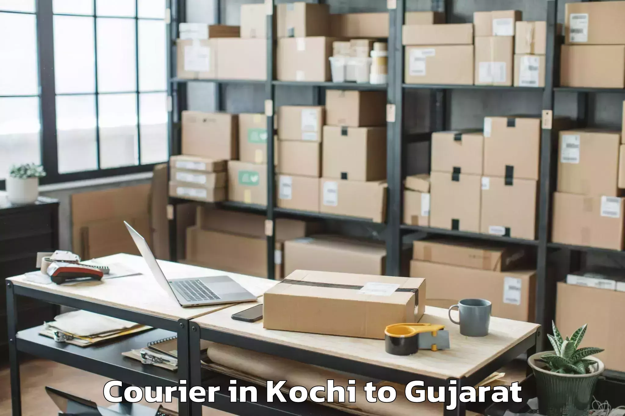 Kochi to Jhalod Courier